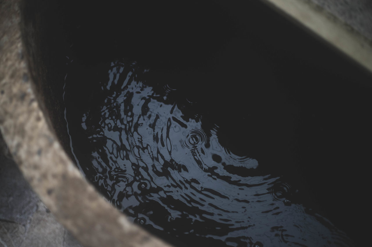 HIGH ANGLE VIEW OF WATER PIPE FROM LAKE