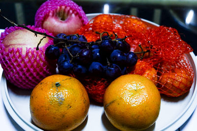 Close-up of fruits in plate