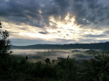 Scenic view of landscape against sky during sunset