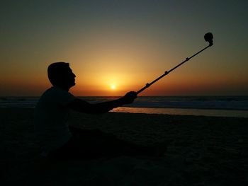 Scenic view of sea at sunset