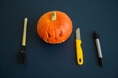 High angle view of pumpkin on table against black background