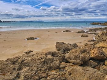 Scenic view of beach against sky