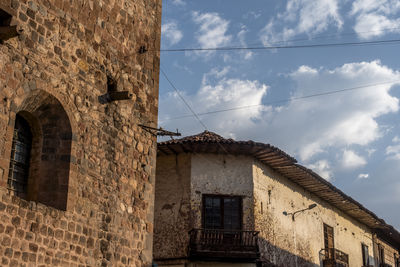 Low angle view of old building against sky