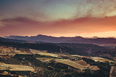 Scenic view of mountains against sky during sunset