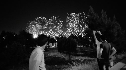 Firework display at night