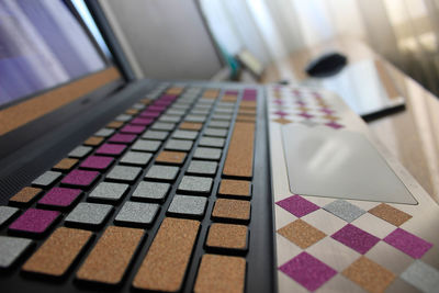 Close-up of multi colored keyboard on laptop