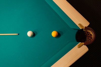 Close-up of pool ball on table