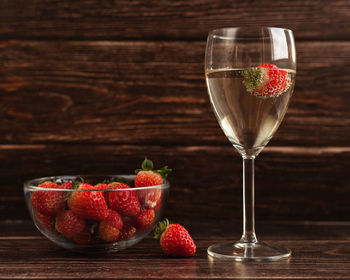 Ice cream in glass bowl on table