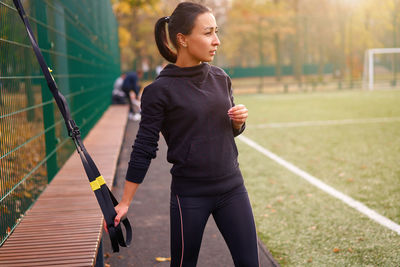 Side view of woman exercising