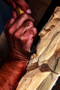 Close-up of man preparing food