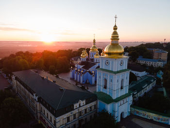 High angle view of buildings against sky during sunset