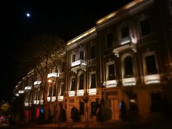 Exterior of illuminated building at night