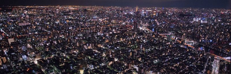 High angle view of illuminated cityscape at night