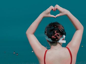 Young woman in swimming pool