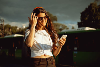 Young woman using mobile phone