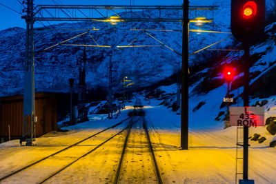 Illuminated street light at night