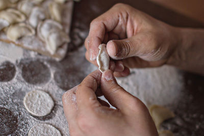 Close-up of person preparing food