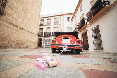 Car on street against building