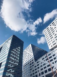 Low angle view of modern buildings against sky