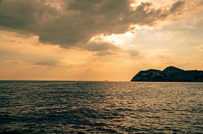 Scenic view of sea against sky during sunset