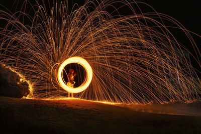 Firework display at night