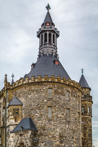 Low angle view of old building against sky