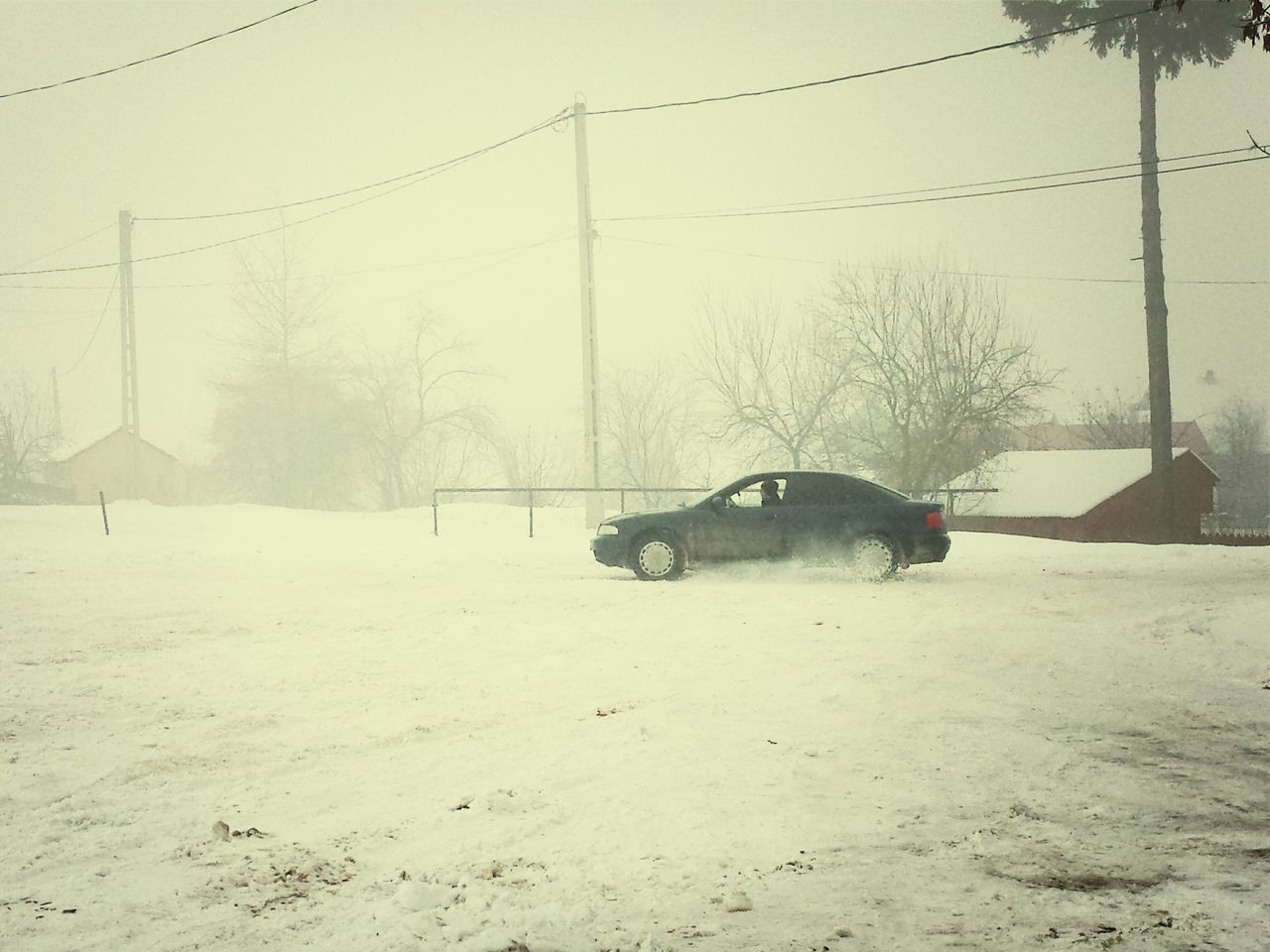 transportation, mode of transport, land vehicle, car, tree, day, stationary, outdoors, road, sand, street, travel, parked, abandoned, snow, field, nature, absence, no people, dirt road