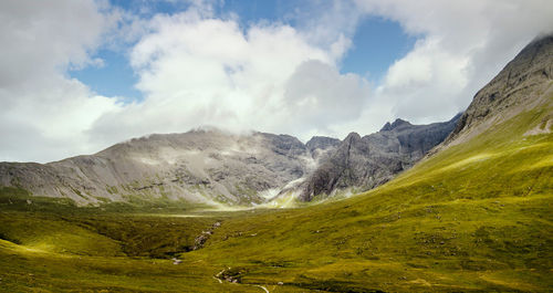 Scenic view of scottish highlands against sky