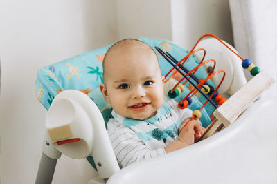 Portrait of cute baby at home