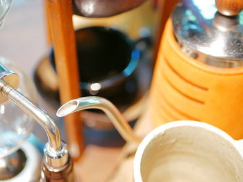 Close-up of coffee cup on table