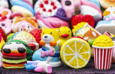 Close-up of multi colored toys for sale