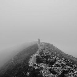 Person standing on mountain