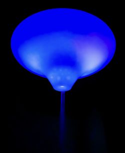 Low angle view of balloons against blue sky