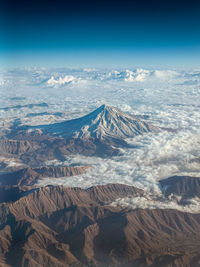 Mount damavand in iran sorrounded by clouds