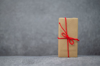 Close-up of paper in box on table