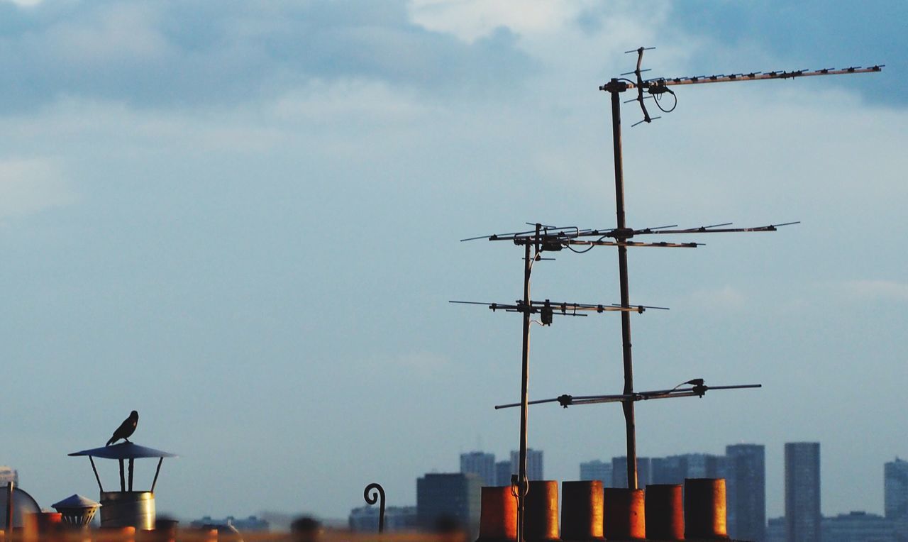 WIND TURBINES AGAINST SKY