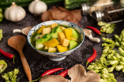 Close-up of chopped vegetables on table