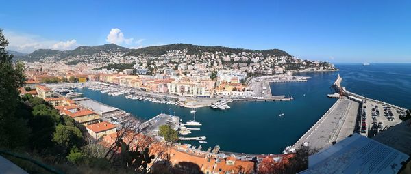 High angle view of townscape by sea