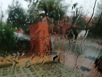 Full frame shot of wet window in rainy season