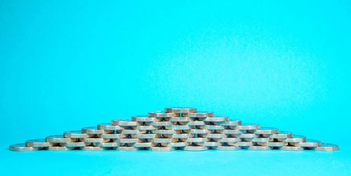 Close-up of stack against blue background