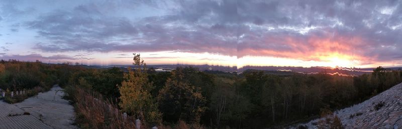 Panoramic view of landscape against sky during sunset