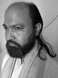 Close-up of thoughtful mature man with beard