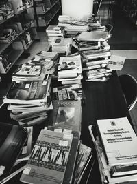 High angle view of books on shelf