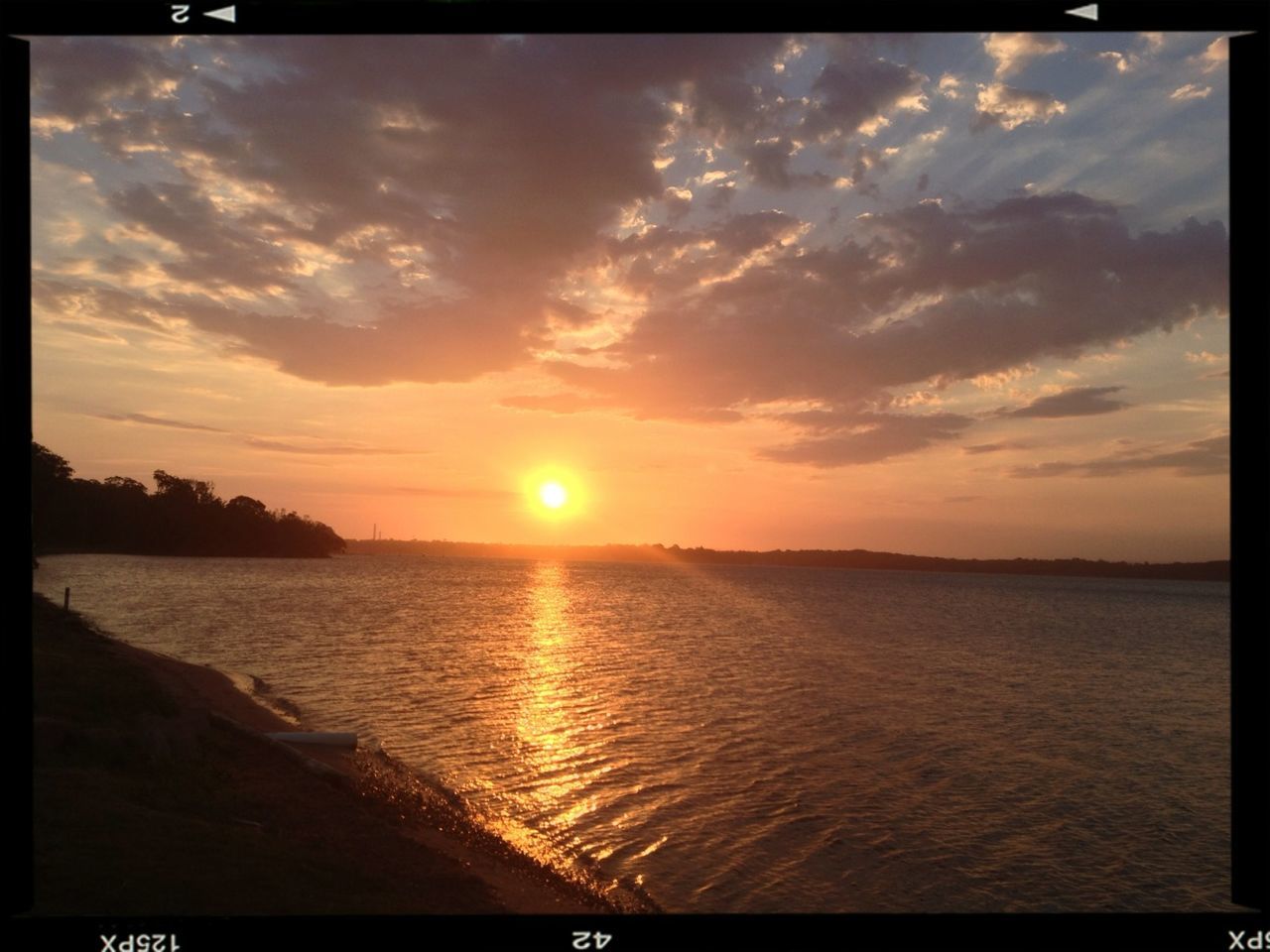 transfer print, sunset, water, sun, scenics, tranquil scene, auto post production filter, sky, beauty in nature, tranquility, sea, nature, orange color, reflection, cloud - sky, idyllic, sunlight, cloud, silhouette, rippled