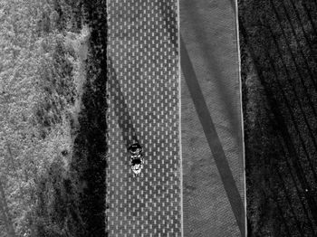 Directly above shot of mother and daughter footpath