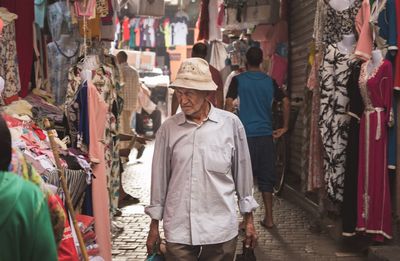 Man standing at market stall