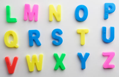 Close-up of multi colored text on white background