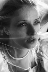 Close-up portrait of young woman