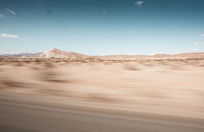 Scenic view of desert against sky