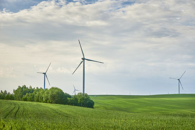 Wind turbine in the field. wind power energy concept. renewable energy for climate protection